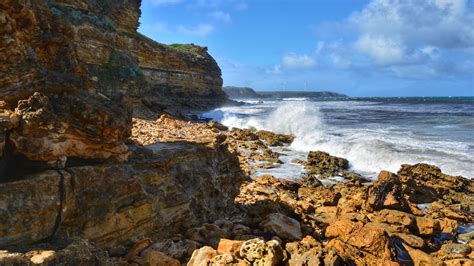Download Wallpaper 2560x1440 Coast Rocks Stones Sea Spray Water