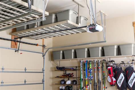 How about creating a suspended, sliding storage system where you could keep all your tools and other goodies? Shelf & Overhead Garage Storage Rack Reviews and Buying Guide