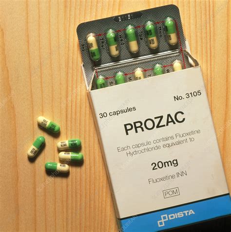 prozac pack with pills on wooden surface stock image m630 0062 science photo library