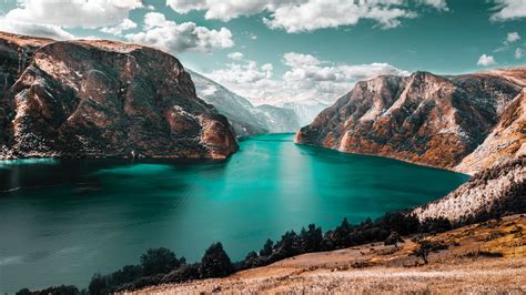 River Between Mountains With Fog Under White Cloudy Blue Sky Hd Nature