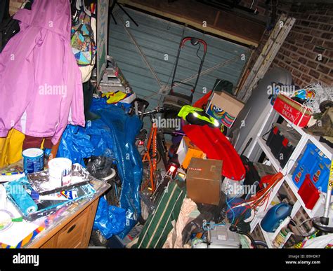 Messy Domestic Garage Full Of Rubbish Stock Photo Alamy