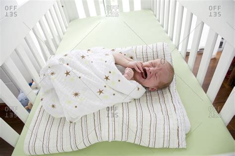 Baby Cries In Crib Photos