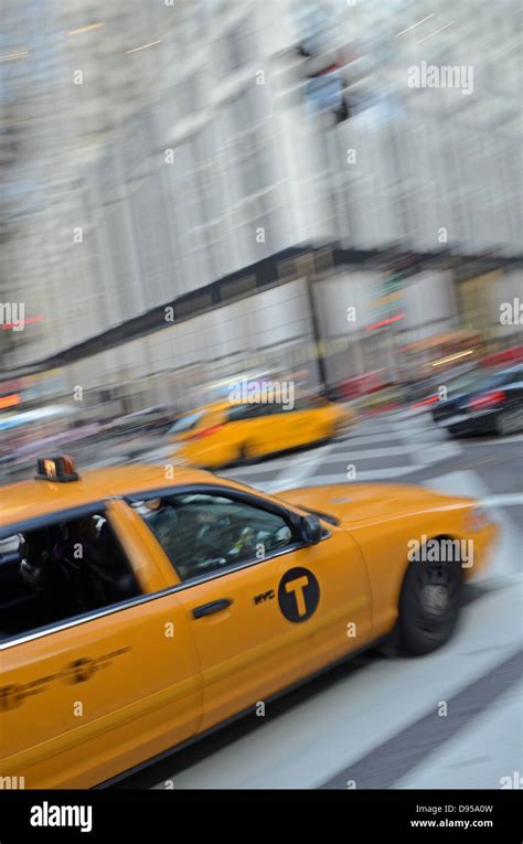 Yellow Cabs In Fifth Avenue Manhattan New York City Stock Photo Alamy