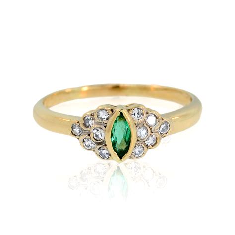 14k Yellow Gold Marquise Cut Emerald And Diamond Ring