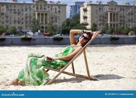 Beautiful Woman Relaxing Lying On A Sun Lounger Stock Images Image 34158114