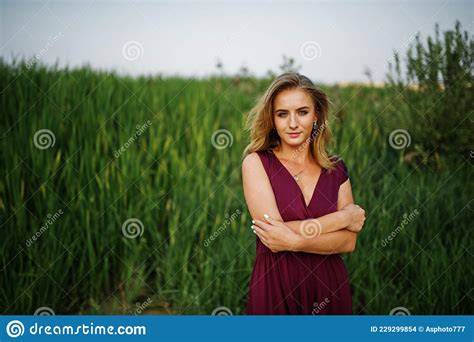 Blonde Sensual Woman In Red Marsala Dress Stock Photo Image Of Beach