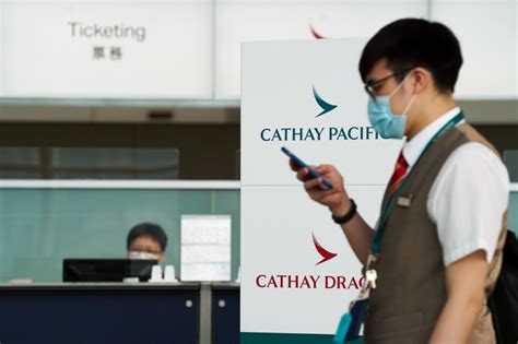 Hong Kongs Cathay Pacific Airways Slashes Jobs Kills Dragon Aviation Al Jazeera