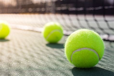 Tennis balls can make a big difference in a player's game, and it is what's more, is that some tennis balls may feel great at first, but after a little bit of use, the pressure in the ball changes and so does. Tennis Ball on Tennis Court - Mayfair Clubs | Fitness ...