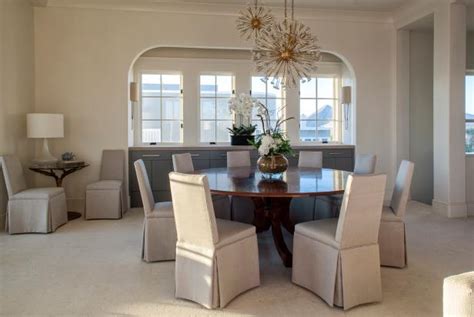 Neutral Dining Room With Arched Opening Hgtv