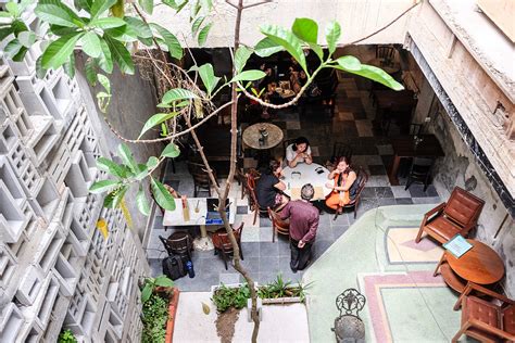 In the café, an air well in the centre lets in light for the small garden of potted herbs. Eat Drink KL: Leaf & Co @ Mingle Kuala Lumpur Hostel ...