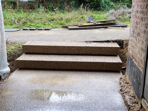 uitgewassen beton terras and oprit aanleggen