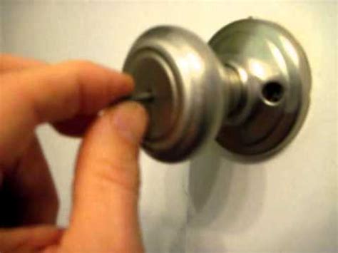 Stretch the belt between the handle and the hook. How to Open a Bathroom or Bedroom Privacy Lock from the ...