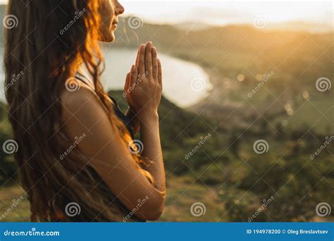 Woman Praying Alone At Sunrise Nature Background Spiritual Emotional