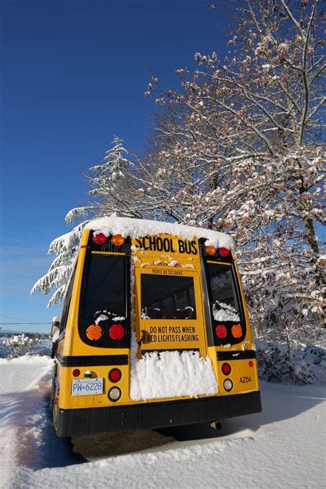 The Well Known Yellow School Bus Covered In Snow In Vancouver Editorial