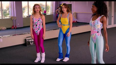 chloe bennet and jessica rothe singing and dancing in 80 s spandex leotards