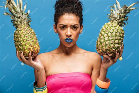 Free Photo Portrait Of Serious Mulatto Woman With Stylish Appearance Frowning Face Being Upset