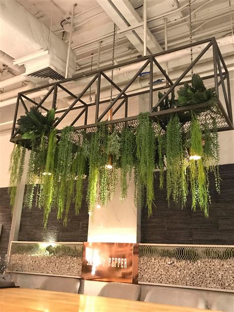 Hang this bar over a low bookshelf or try right behind your couch. Urban industrial style metal hanging planter with lights ...