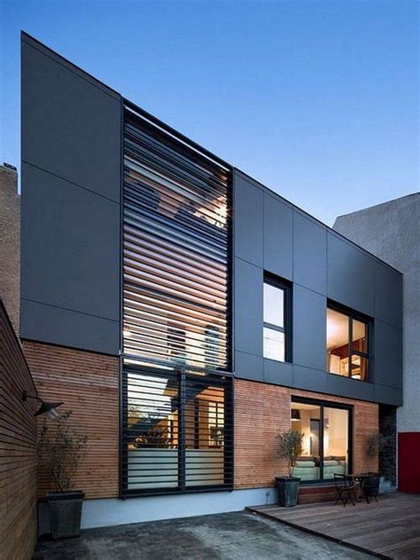 Open floor plans are a signature characteristic of this style. 40+ Amazing Modern Building Facade | Modern brick house ...