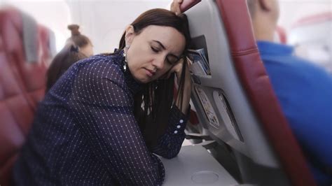 A Woman Asleep On Plane During Flight Stock Footage Sbv