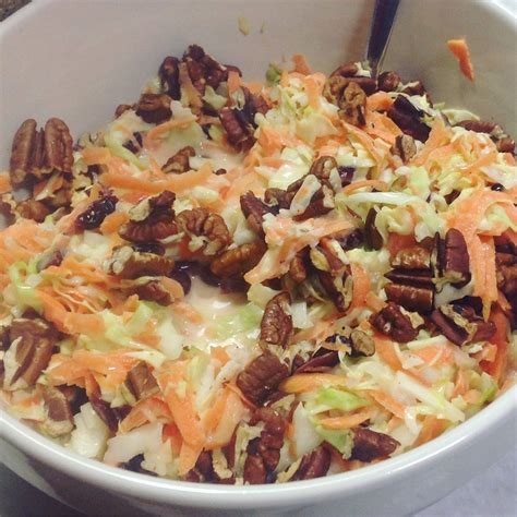 Squeeze some coleslaw dressing over top, add a sprinkle of onion powder and a sprinkle of celery salt. Coleslaw with raisins and pecans | Food, Salad bar, Recipes
