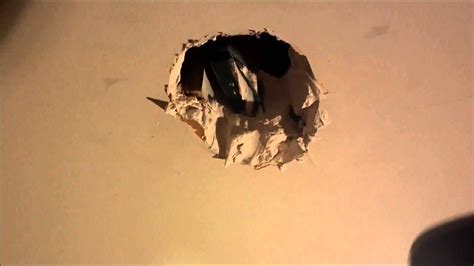 First cut the plaster and remove the plug. Plastering Hole and Crack Repair in a Drywall Ceiling ...