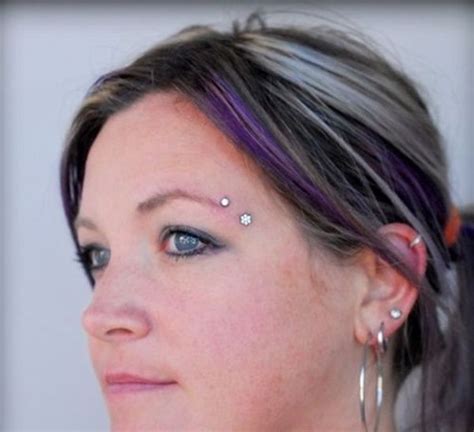 Horizontal Brow Piercing With An Angle Eyebrow Piercing Horizontal