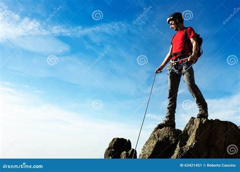 Climber Helps Ascent Of Two Climbers On A Mountain Top Royalty Free