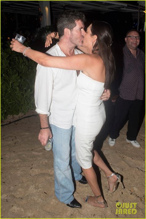 simon cowell smooches lauren silverman for new year s 2016 photo 3542650 simon cowell photos