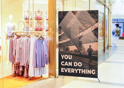 Poster Size Banner Mockup Banner Besides Women Clothing Store