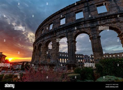 Pula Amphitheater At Sunset Also Known As Coliseum Of Pula Is A Well