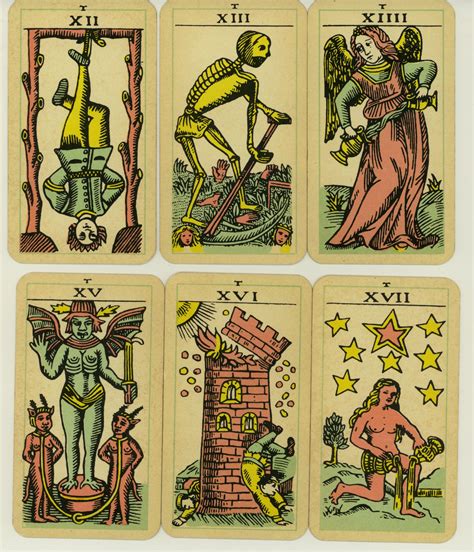 Four Different Tarot Cards With Images Of People And Animals In The