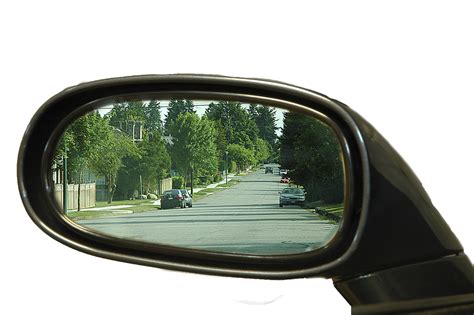 Q On How To Adjust The Side View Mirrors