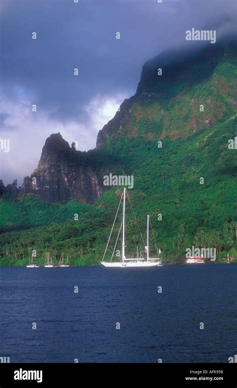 Boats At Anchor In Cooks Bay On The Island Of Moorea In Tahiti French