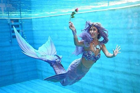 Immerse In A Beguiling Underwater Display As Singapores First Mermaid