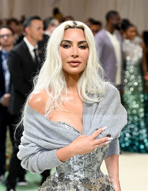 Kim Kardashians Metallic Lace Margiela Dress Shines At Met Gala 2024