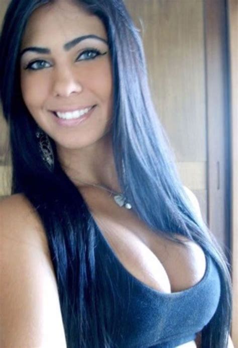 A Woman With Long Blue Hair Smiling At The Camera And Text That Reads