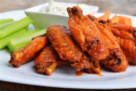 In a small bowl mix the soy sauce, oyster sauce, sherry, salt and pepper and pour mixture over chicken; Deep fried wings - Wing It