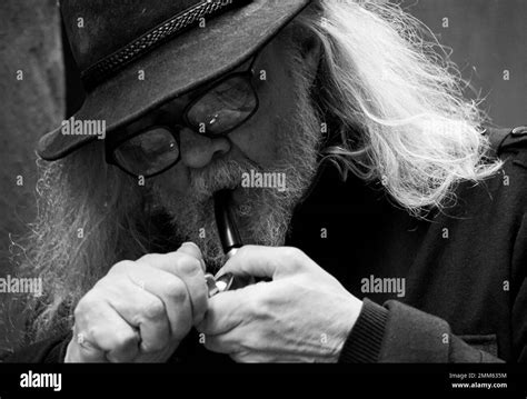 Close Up Of A Old Man Smoking Pipe Stock Photo Alamy