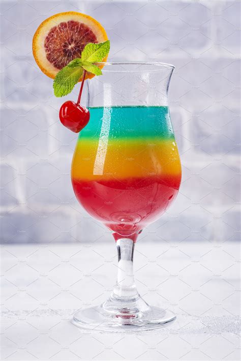 Summer Rainbow Layered Cocktail ~ Food And Drink Photos ~ Creative Market