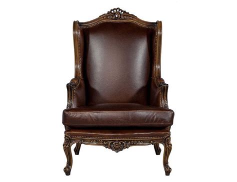 Featuring a studded border on the sides, this recliner is both stylish and comfortable with its extra padded cushion. Pair of Mahogany Leather Louis XV Wing Chairs For Sale at ...