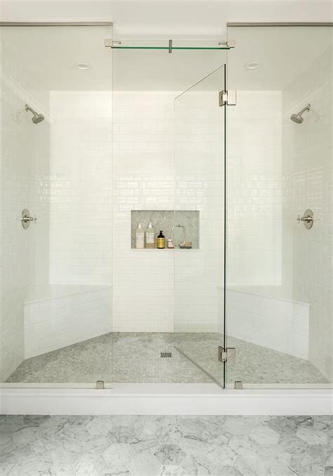 walk in shower with his and hers benches transitional bathroom