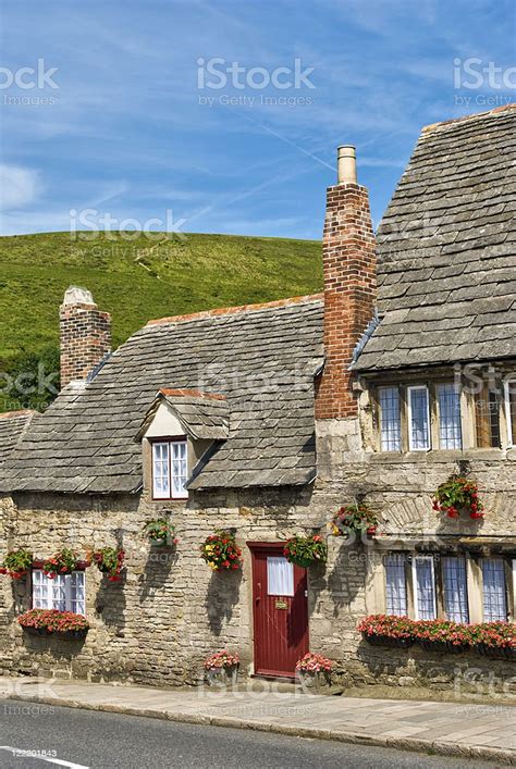 Row Of Limestone Cottages In An English Village Stock Photo Download