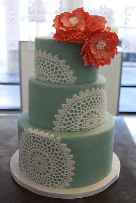 Gorgeous Greenblue Tiered Wedding Cake With Lace Accents And Pink