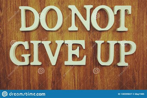 Do Not Give Up Word Made From Wooden Cubes With Letters Alphabet On