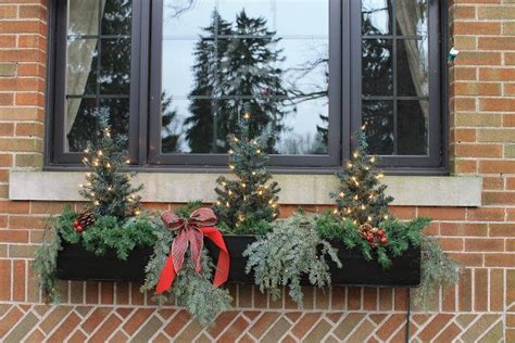 Holiday Window Box With Artificial And Natural Greens Mixed Together