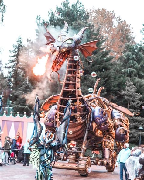 maleficent dragon breathing fire during the disneyland paris parade villain parade float from
