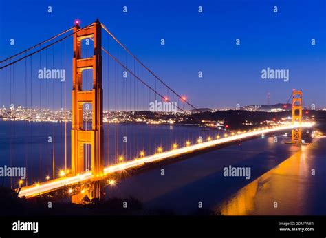 View Of Suspension Bridge At Night Stock Photo Alamy