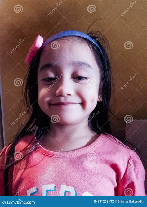 Asian Little Girl With Dimple On Face Is Smiling Stock Photo Image Of