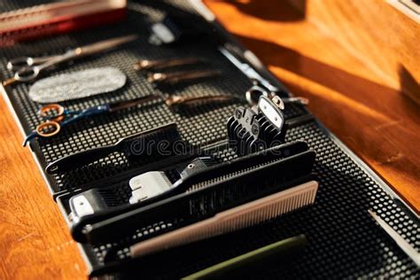 Barber Scissors And Combs On Black Rubber Mat Stock Image Image Of