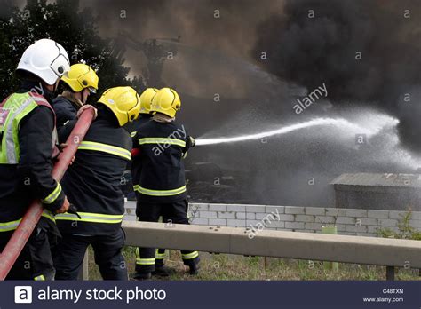 Firefighters Tackle A Large Blaze At A Scrapyard Stock Photo Alamy